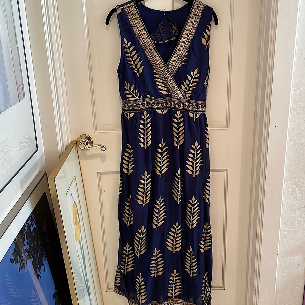 Women’s blue dress with gold embellishment